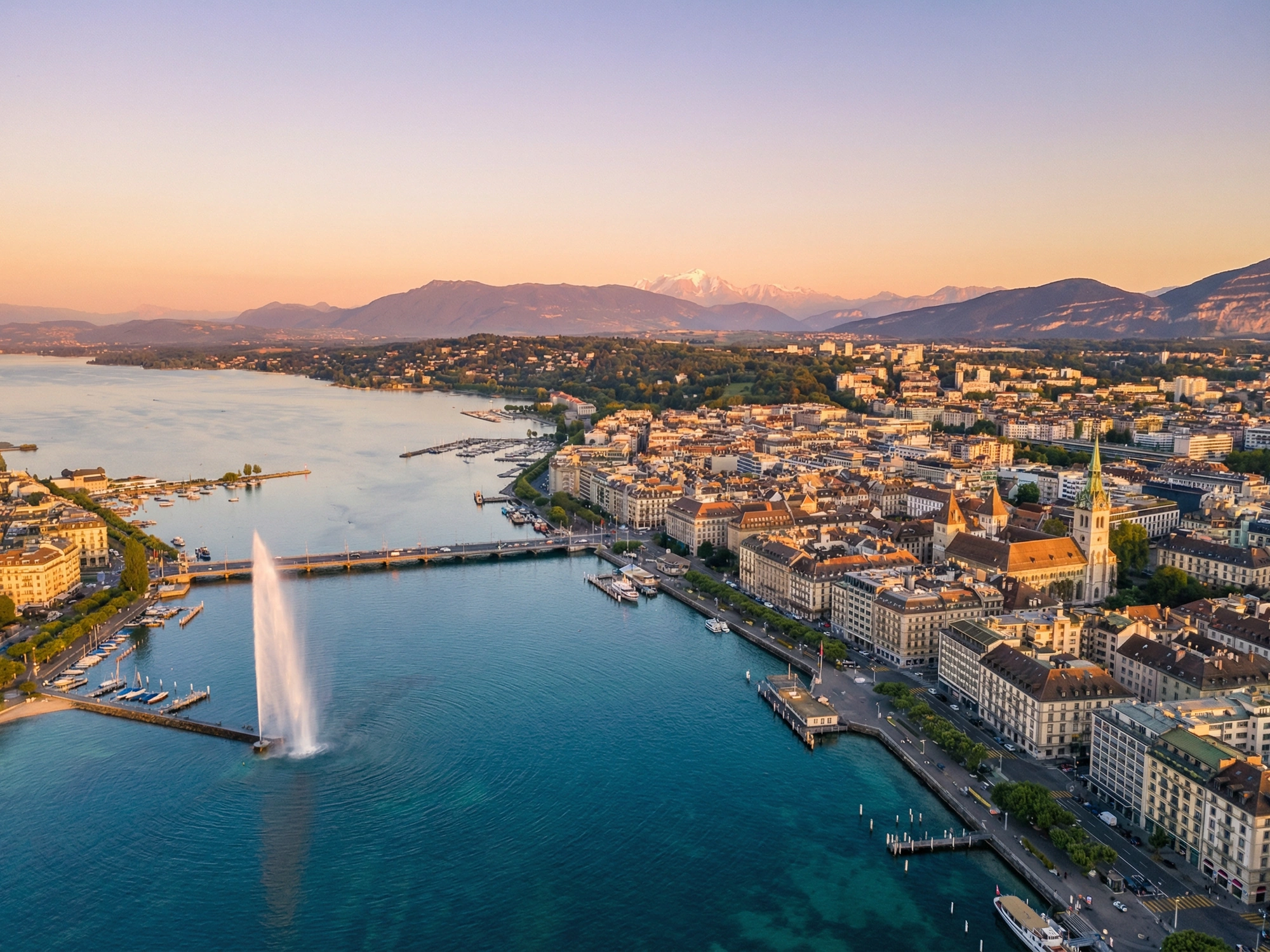 Panoramic aerial view of Geneva skyline at golden hour