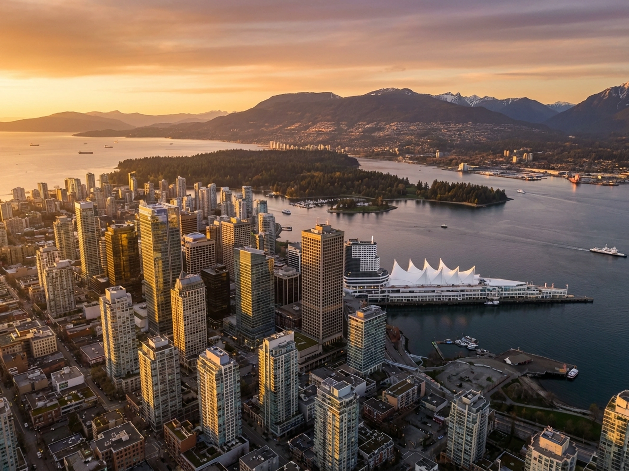 Panoramic aerial view of Vancouver skyline at golden hour
