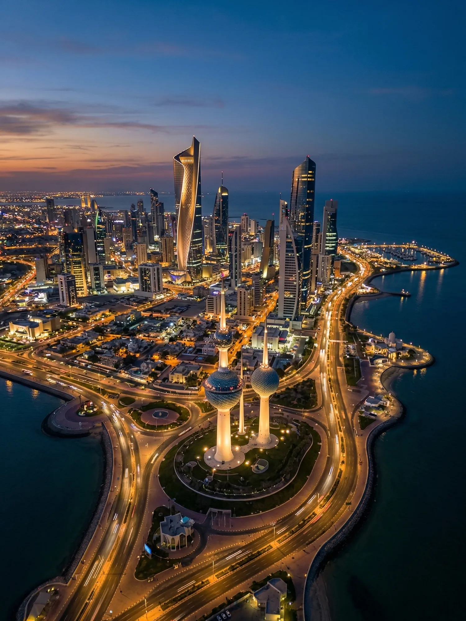 Panoramic aerial view of Kuwait skyline at golden hour