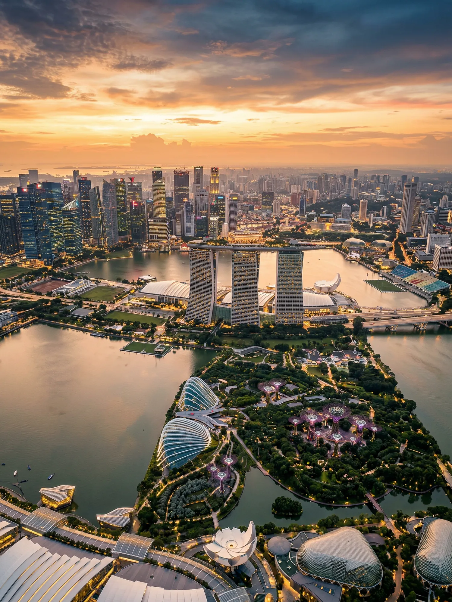 Panoramic aerial view of Singapore skyline at golden hour