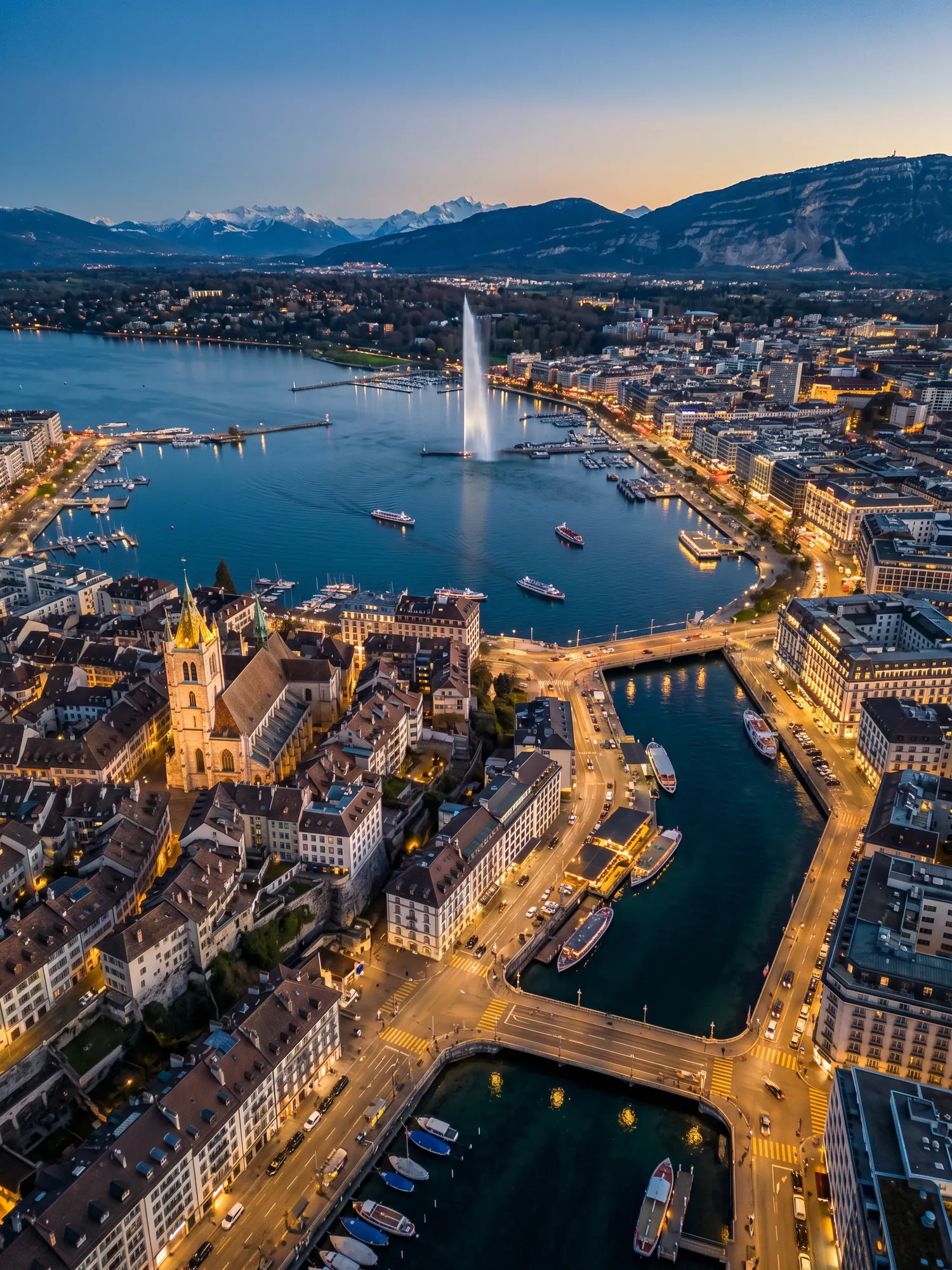 Panoramic aerial view of Geneva skyline at golden hour