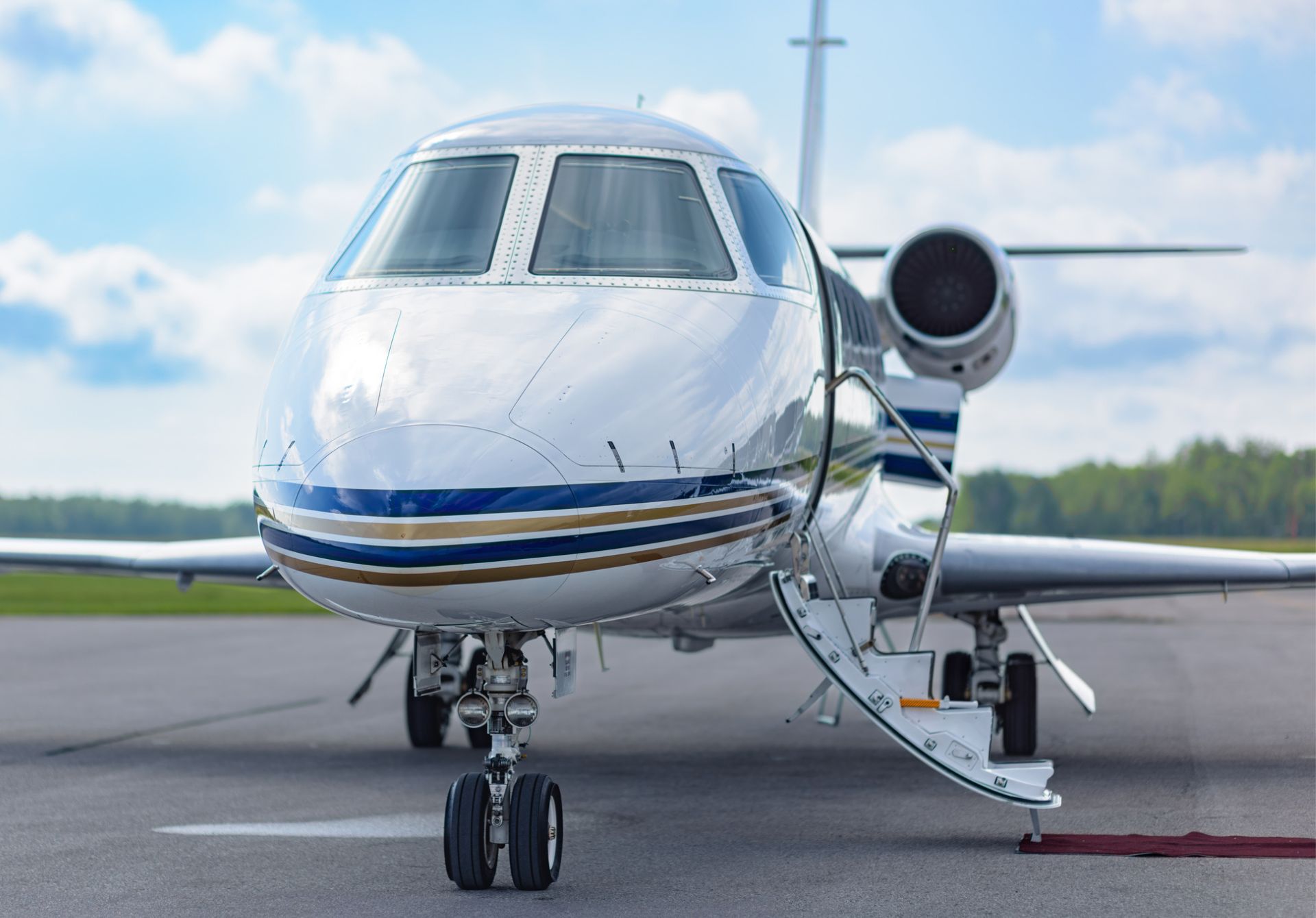 Image of Boarding Stairs Of A Private Jet Extend To The Ground