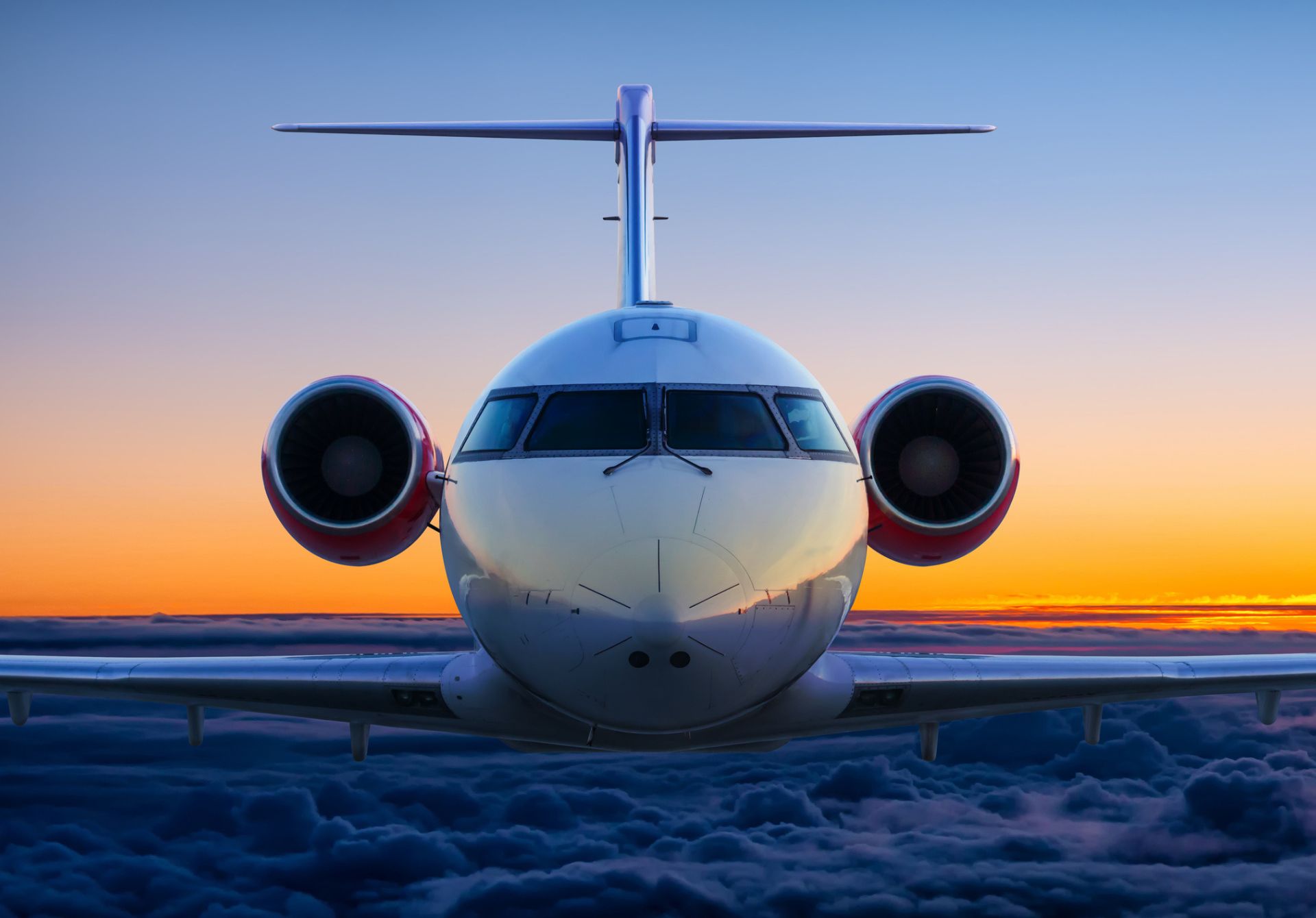 Image of Private Jet Front View In The Sunset Sky
