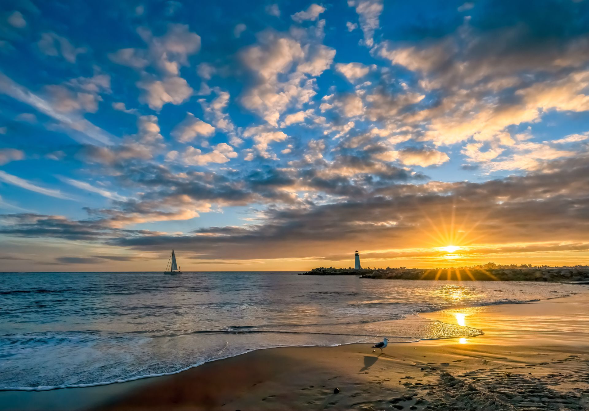 Image of The Walton Lighthouse At The Santa Cruz CA Harbor At Sunse