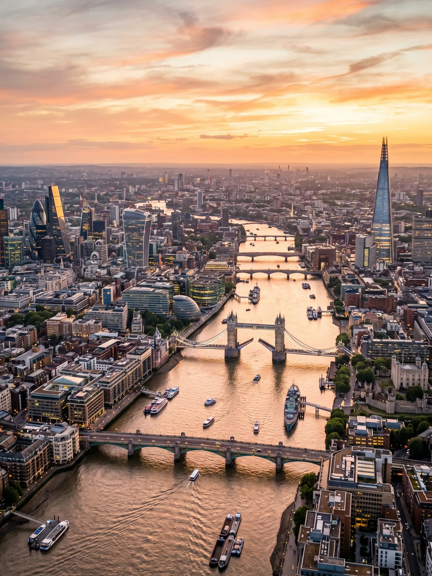 Panoramic aerial view of London skyline at golden hour