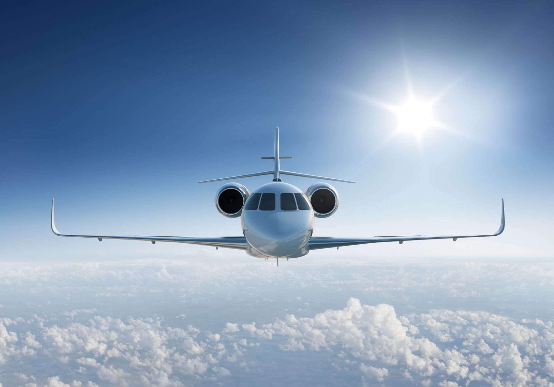 Image of Private Jet Above The Clouds